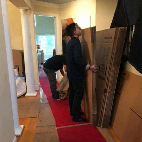 optimum movers preparing boxes