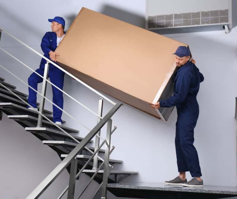 movers carrying heavy box