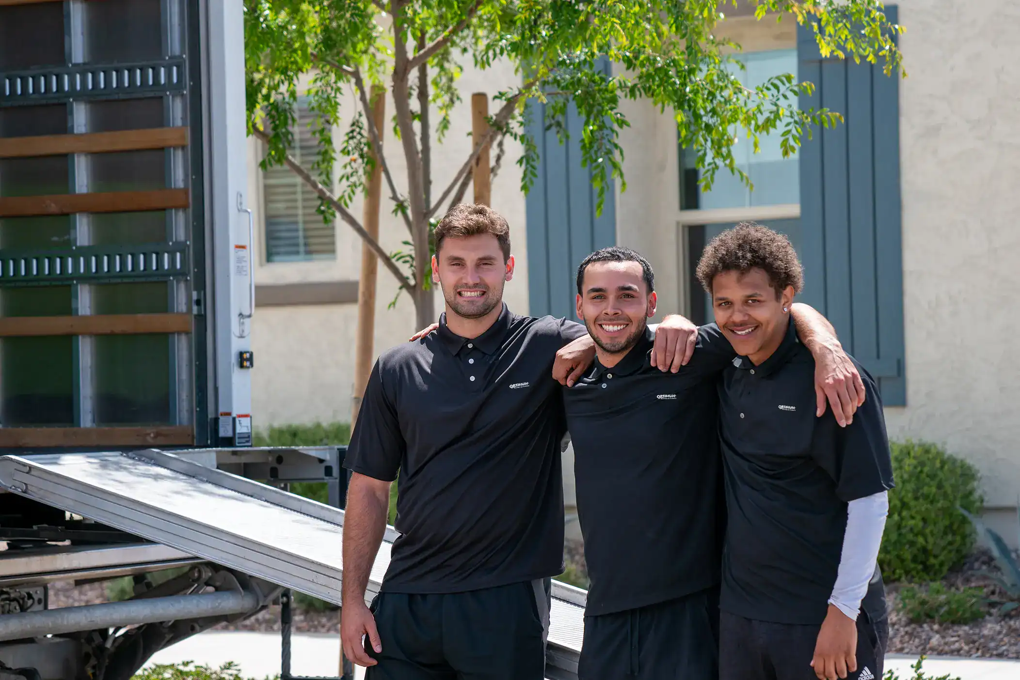 Movers posing for a photo.